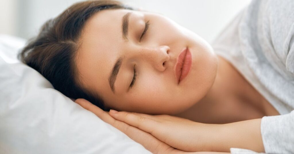 Woman sleeping peacefully without allergies on a Naturelle organic latex mattress