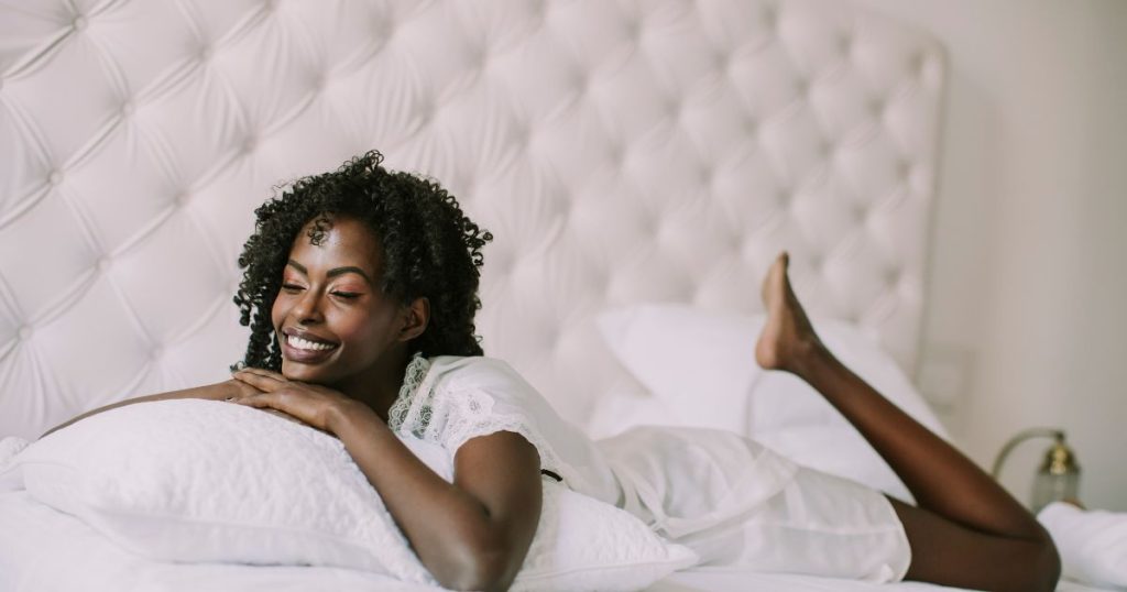 Woman resting on a latex pillow