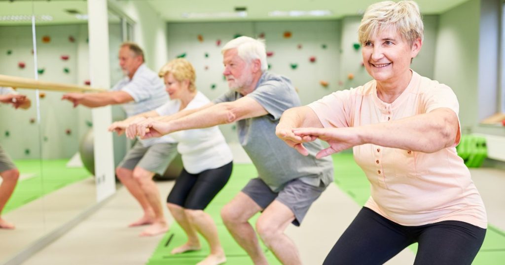 Energetic senior citizens participating in an exercise class.
