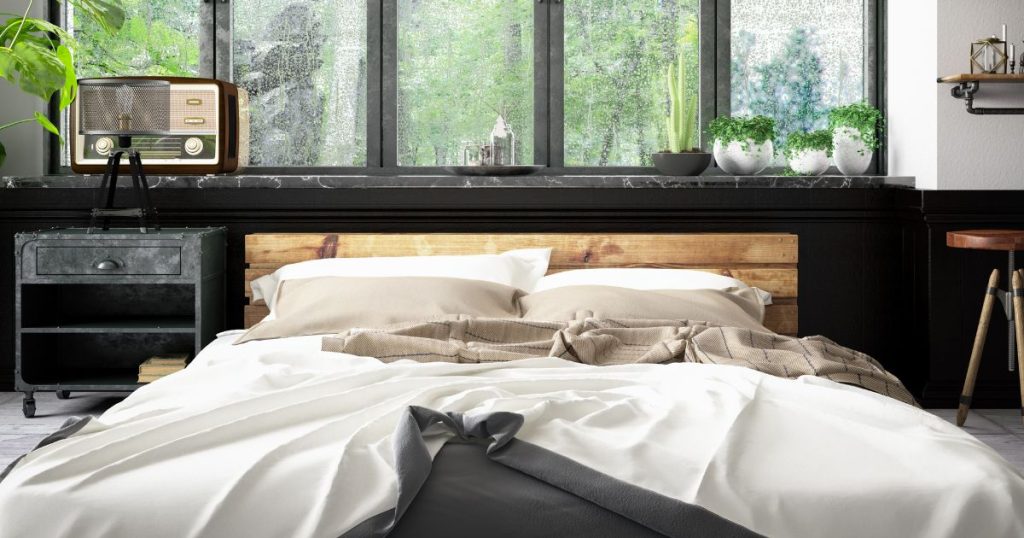 A cozy bedroom with an ethically sourced and biodegradable pure wool duvet from Naturelle.