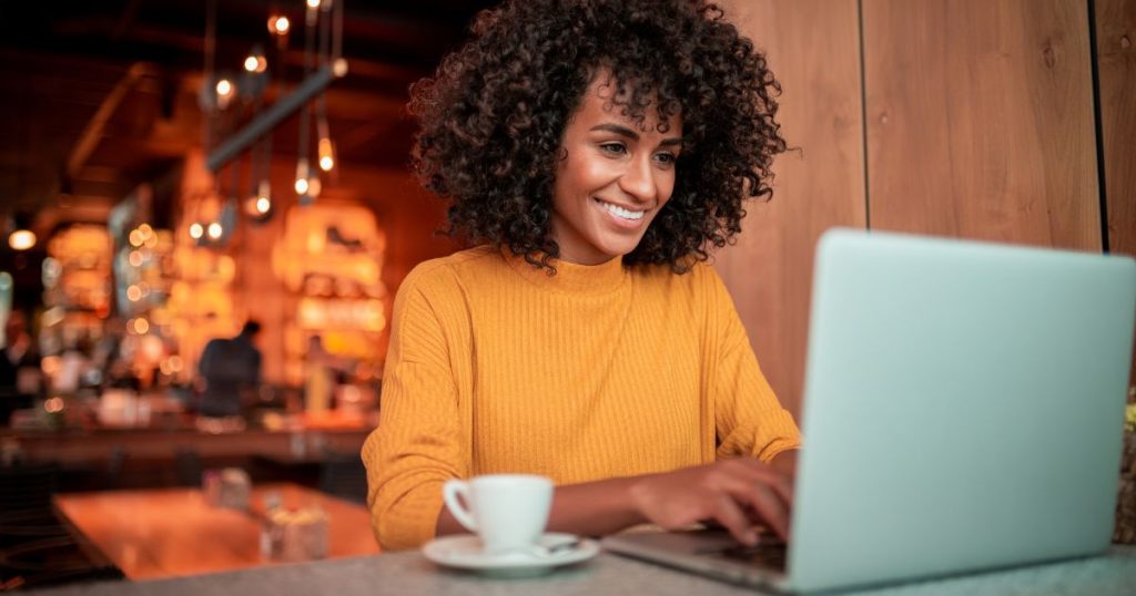 Woman researching how to buy a mattress online