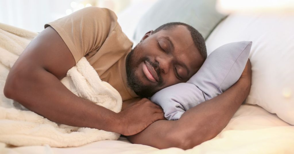 Man comfortably sleeping on his side